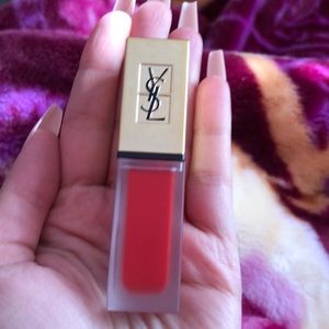 it was a gift. I do not wear red lipstick. never swatched. brand new with no box
